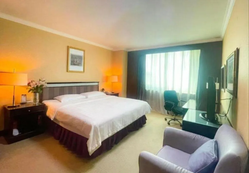 Bed in Changchun Zhuozhan Days Hotel