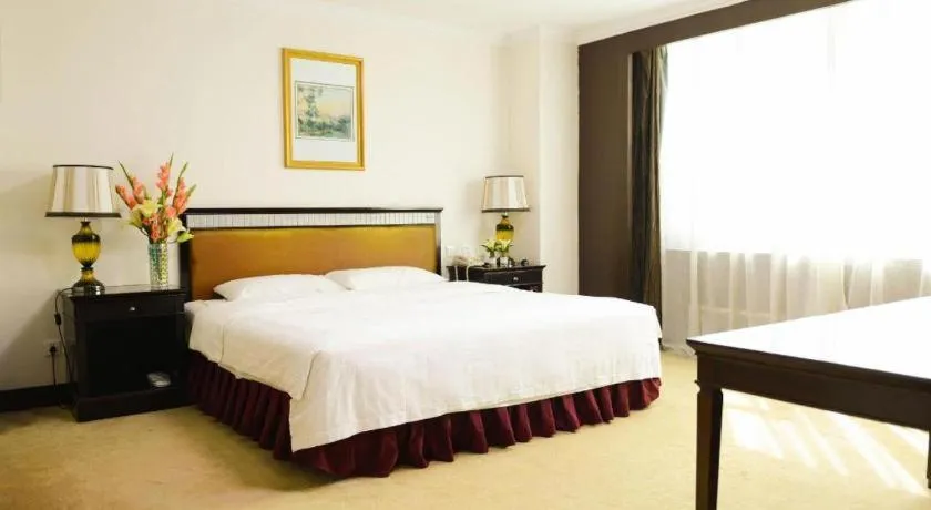 Bed in Changchun Zhuozhan Days Hotel