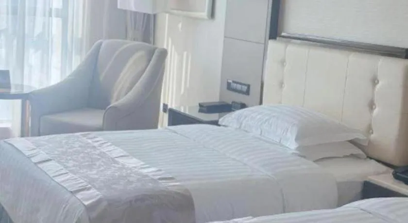 Bed in Jin Jiang Mingcheng Hotel