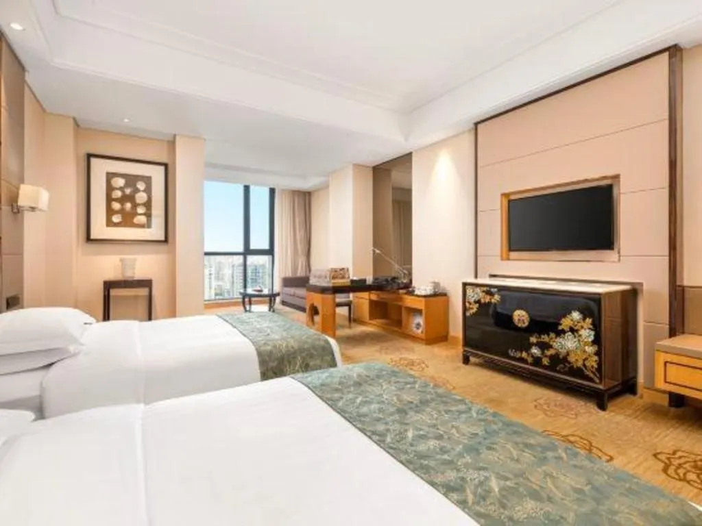 Bed in Jin Jiang Mingcheng Hotel