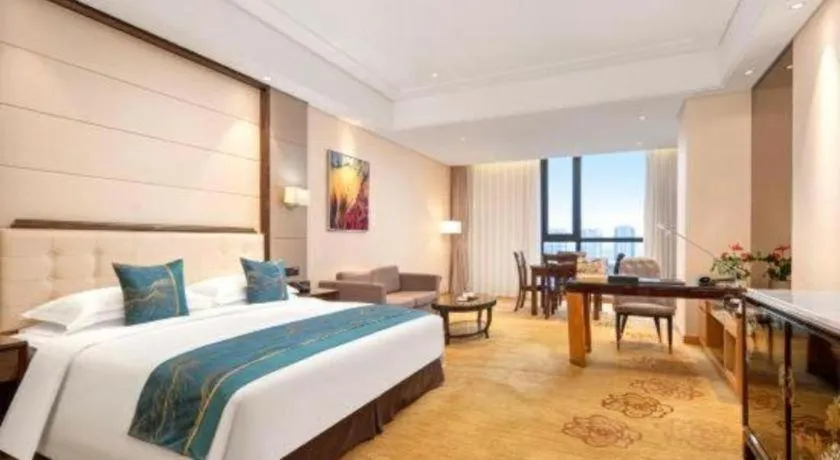 Bed in Jin Jiang Mingcheng Hotel