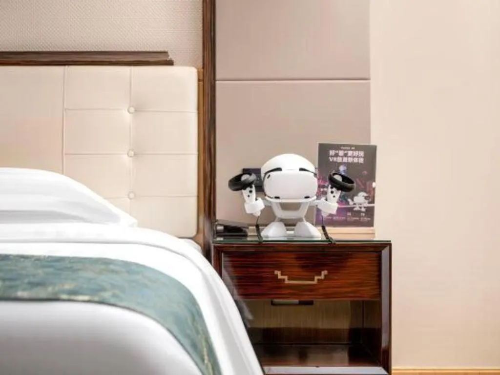 Bed in Jin Jiang Mingcheng Hotel