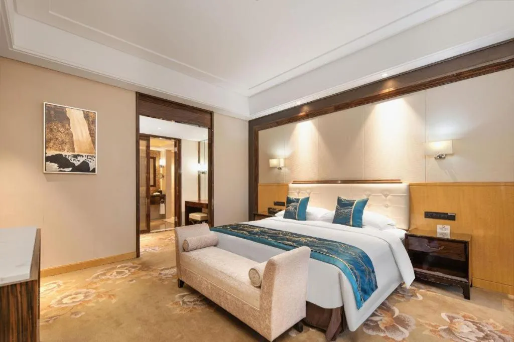 Bed in Jin Jiang Mingcheng Hotel