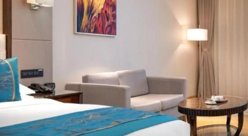 Bed in Jin Jiang Mingcheng Hotel