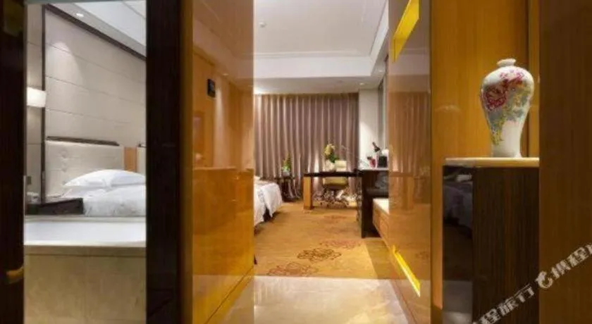 Bed in Jin Jiang Mingcheng Hotel