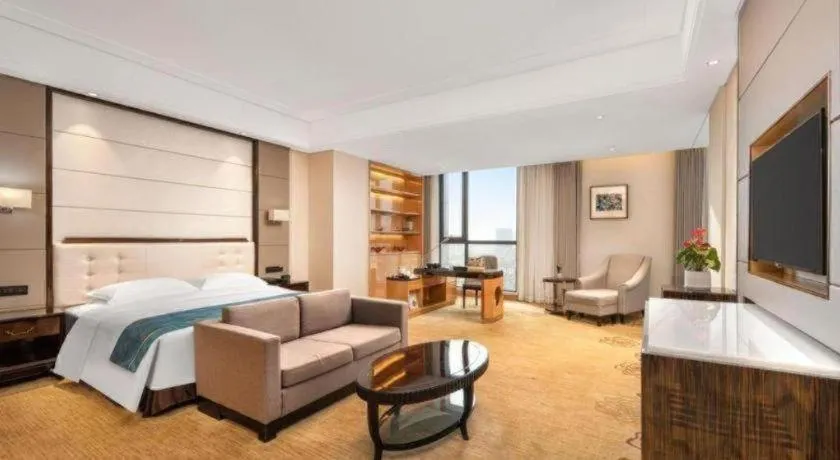 Bed in Jin Jiang Mingcheng Hotel