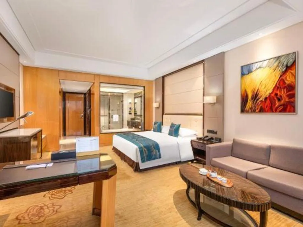 Bed in Jin Jiang Mingcheng Hotel