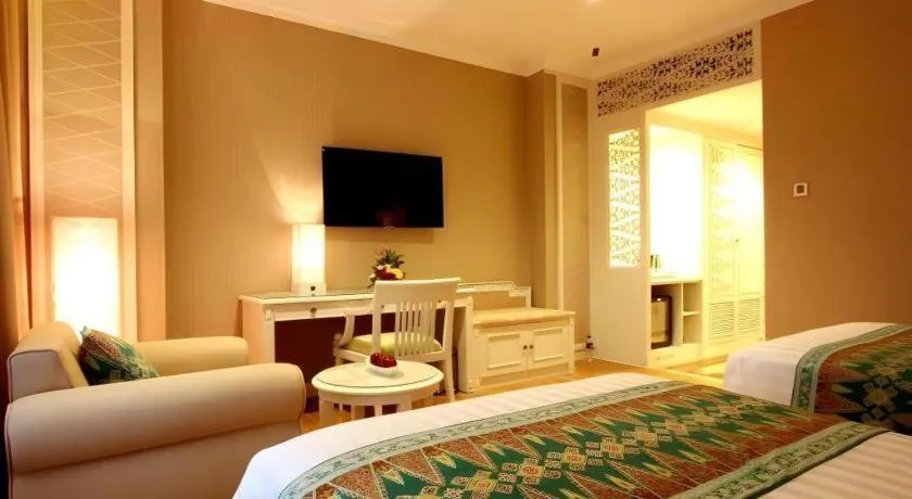 Bed in Kartika Chandra Hotel