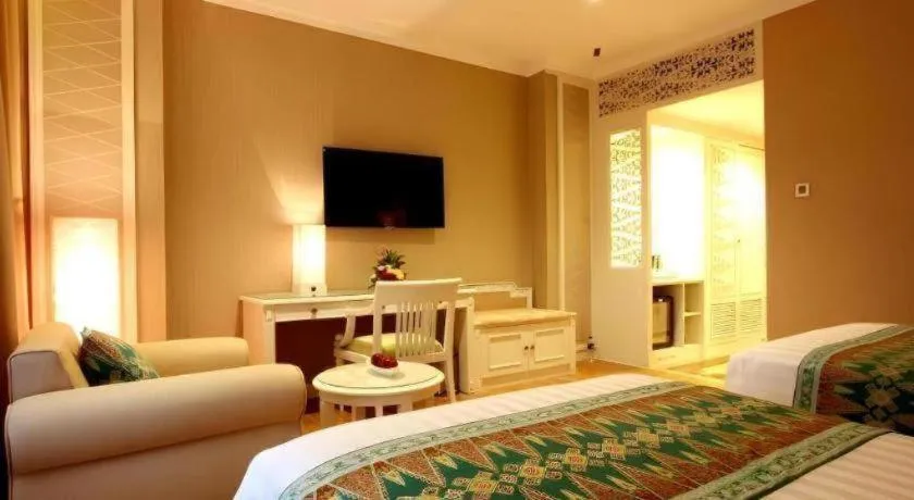 Bed in Kartika Chandra Hotel