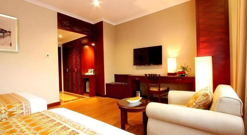 Bed in Kartika Chandra Hotel