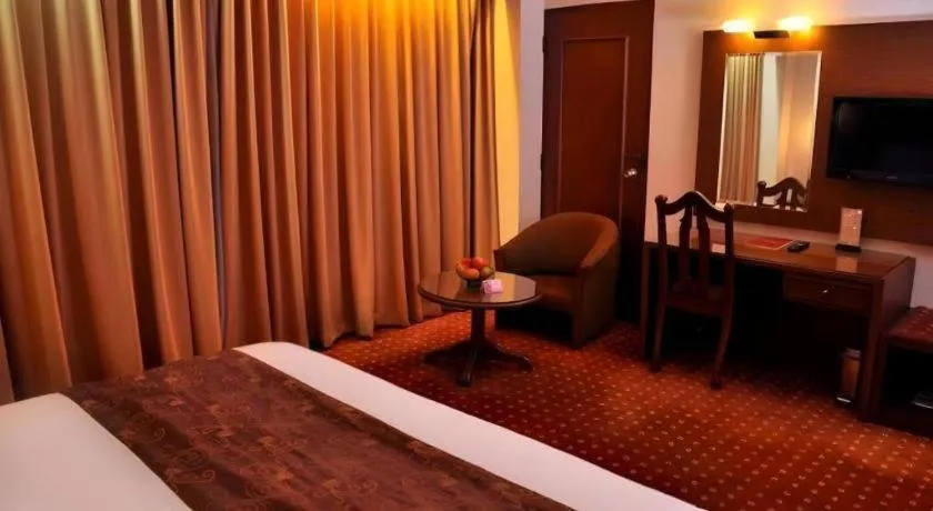 Bed in Kartika Chandra Hotel