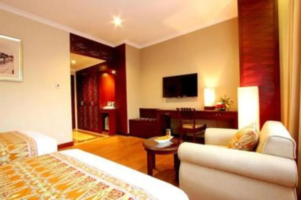 Bed in Kartika Chandra Hotel