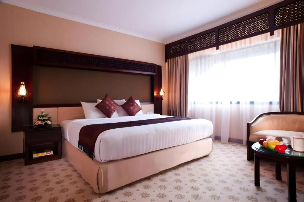 Bed in Kartika Chandra Hotel