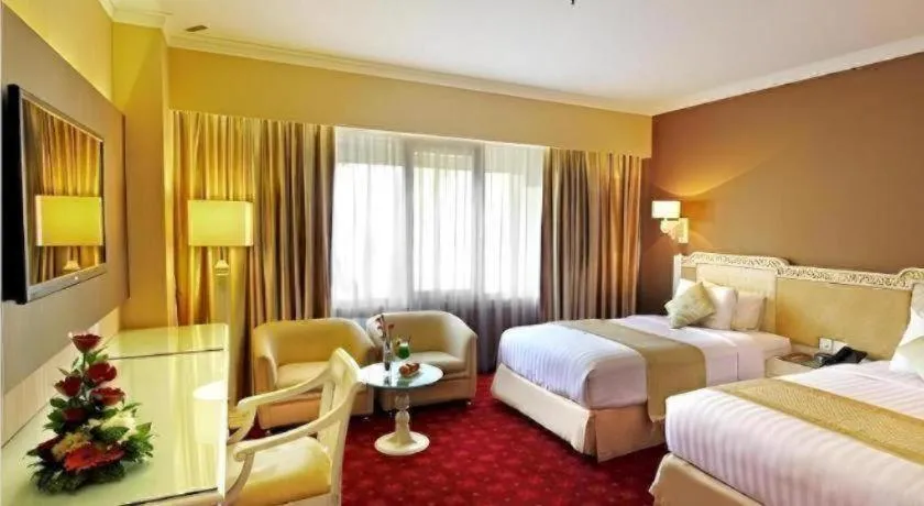 Bed in Kartika Chandra Hotel