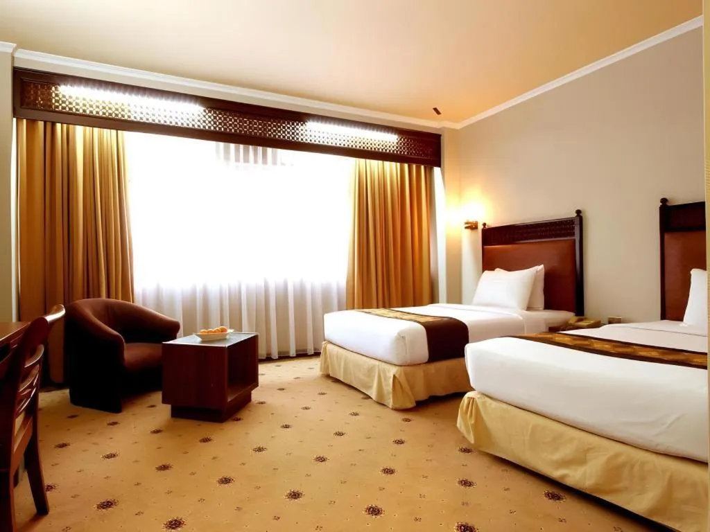 Bed in Kartika Chandra Hotel