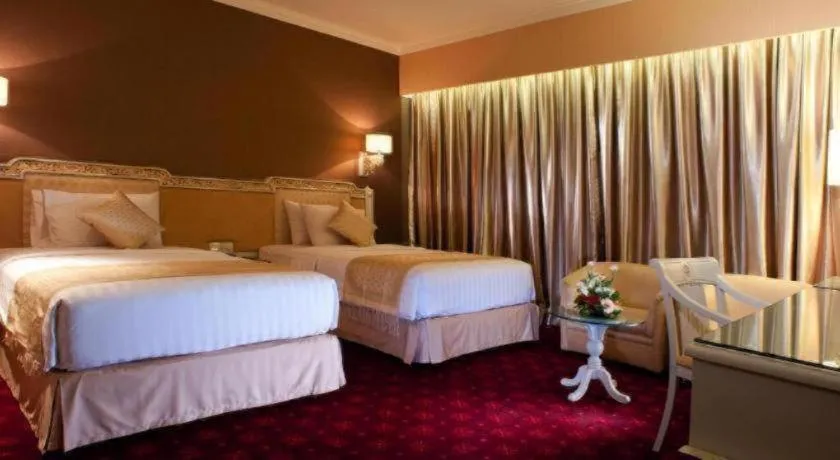 Bed in Kartika Chandra Hotel