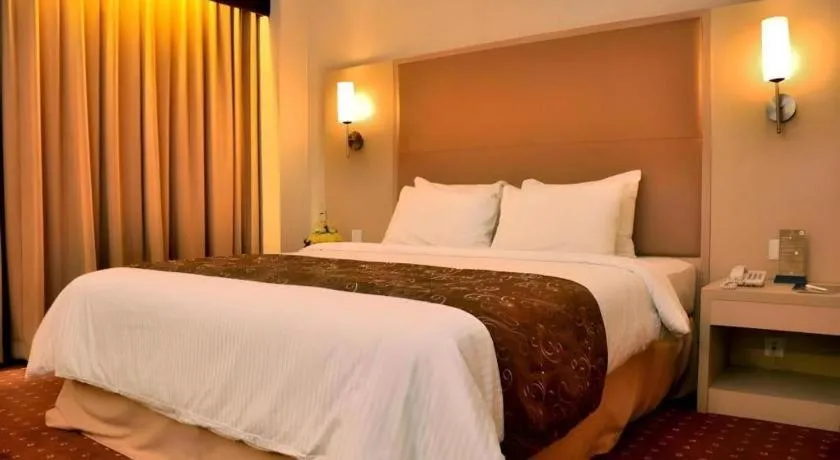 Bed in Kartika Chandra Hotel