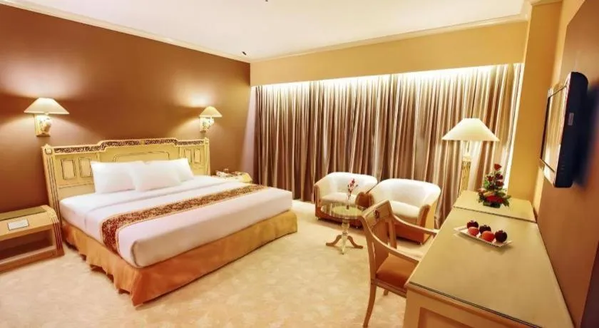 Bed in Kartika Chandra Hotel