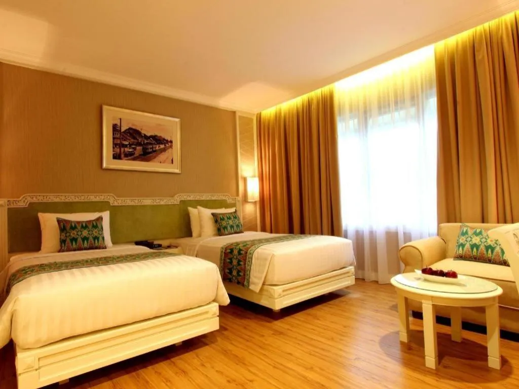 Bed in Kartika Chandra Hotel