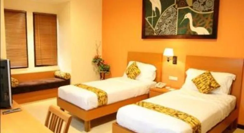 Bed in The Luxio Hotel