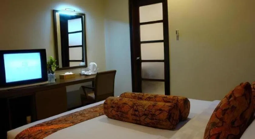 Bed in The Luxio Hotel