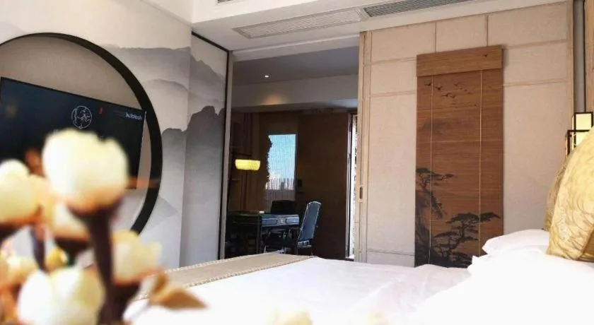 Bed in Yuan Culture Hotel Shenzhen World Shajing