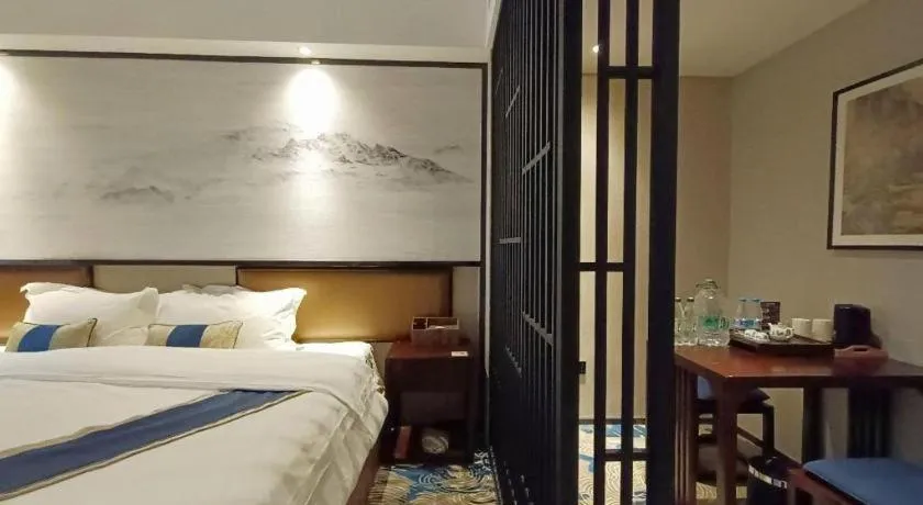 Bed in Yuan Culture Hotel Shenzhen World Shajing