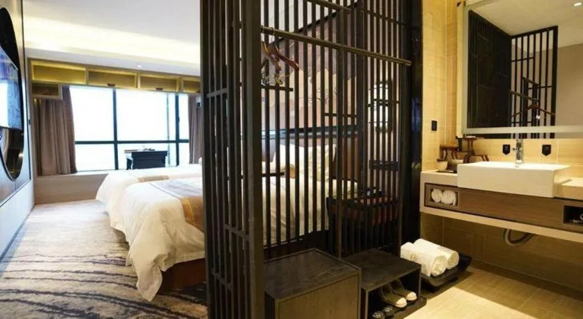 Bed in Yuan Culture Hotel Shenzhen World Shajing