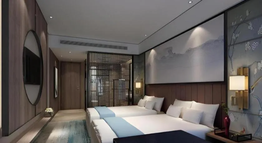 Bed in Yuan Culture Hotel Shenzhen World Shajing