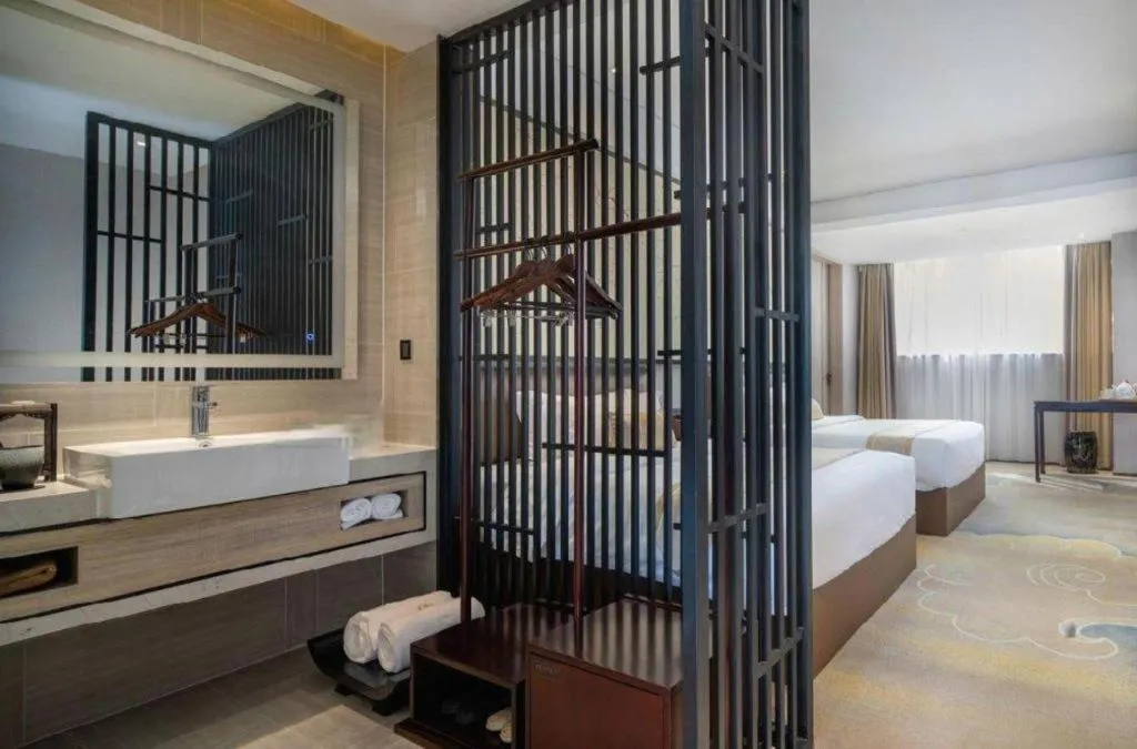 Bed in Yuan Culture Hotel Shenzhen World Shajing