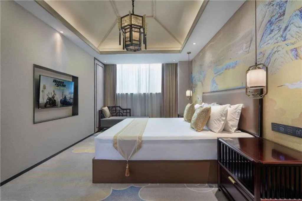 Bed in Yuan Culture Hotel Shenzhen World Shajing