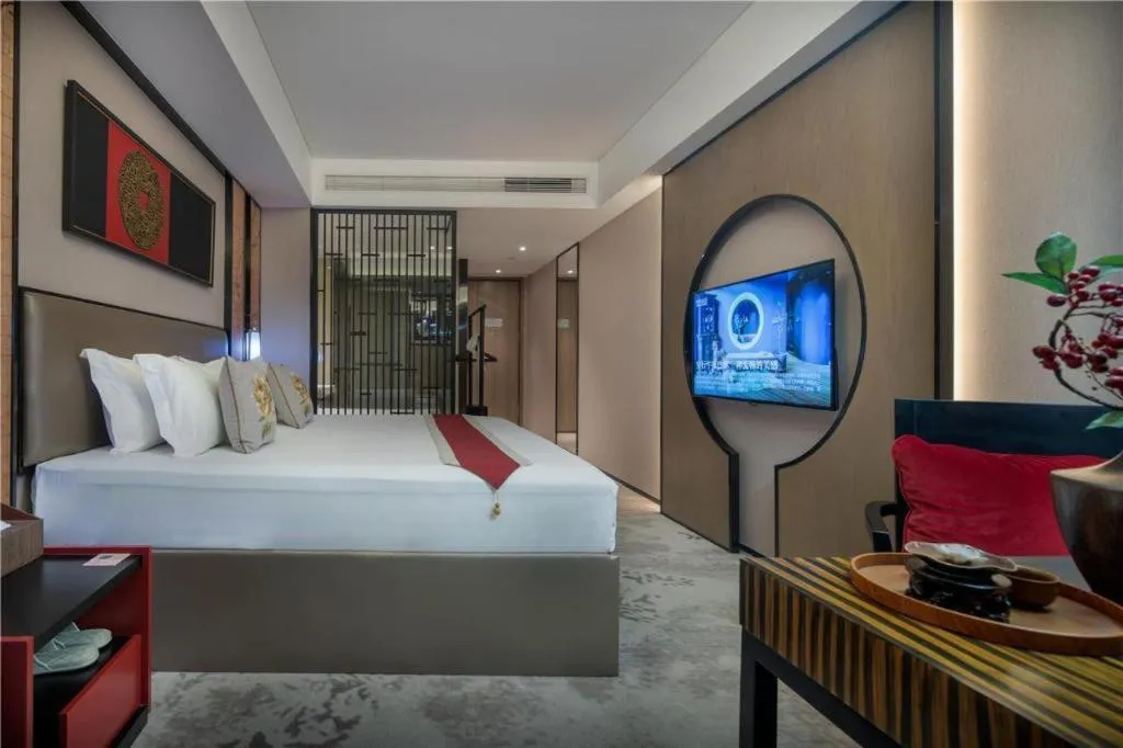 Bed in Yuan Culture Hotel Shenzhen World Shajing