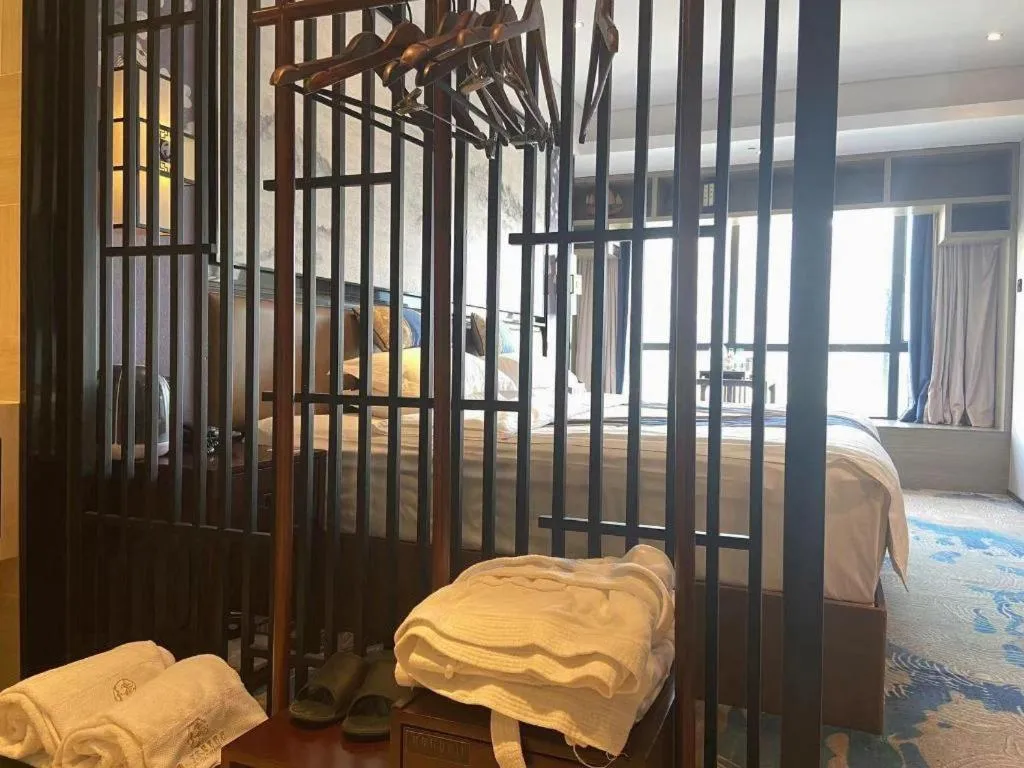 Bed in Yuan Culture Hotel Shenzhen World Shajing