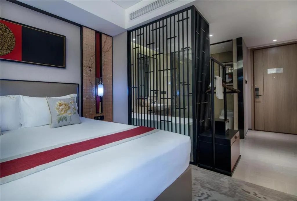 Bed in Yuan Culture Hotel Shenzhen World Shajing