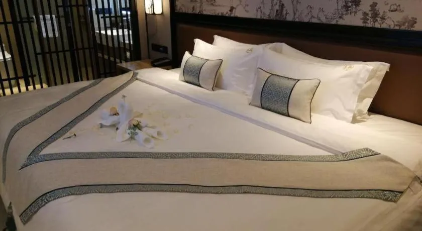 Bed in Yuan Culture Hotel Shenzhen World Shajing