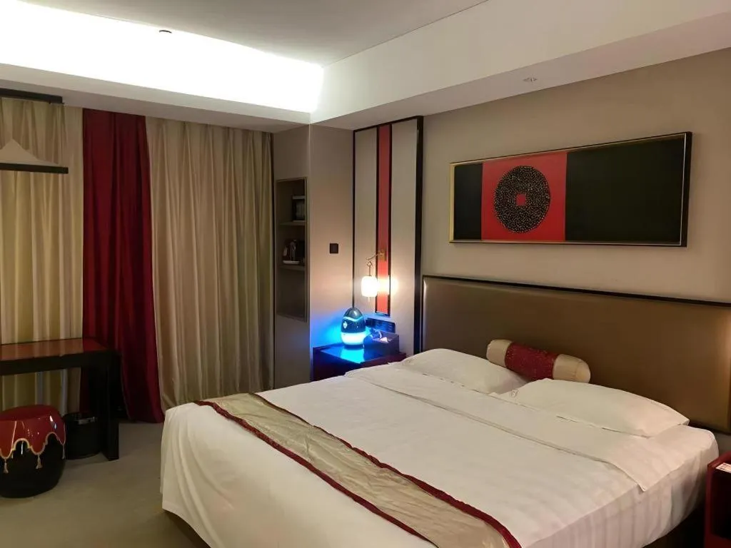 Bed in Yuan Culture Hotel Shenzhen World Shajing