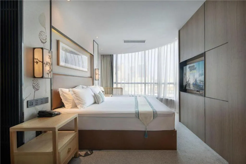 Bed in Yuan Culture Hotel Shenzhen World Shajing