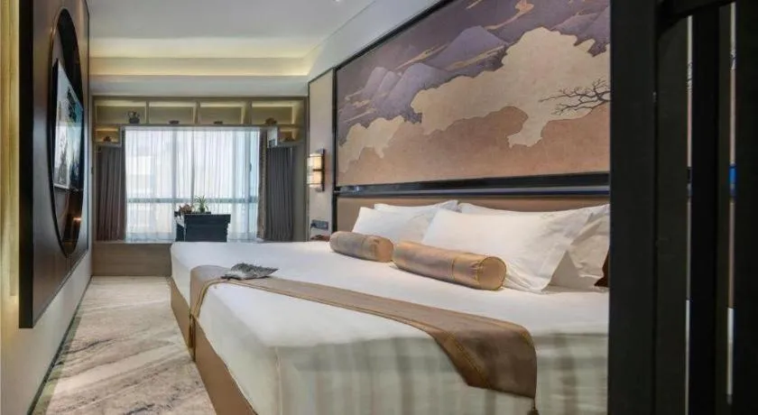Bed in Yuan Culture Hotel Shenzhen World Shajing