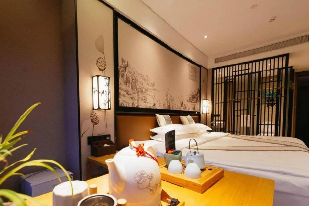 Bed in Yuan Culture Hotel Shenzhen World Shajing
