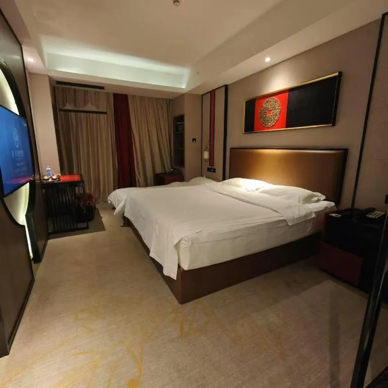 Bed in Yuan Culture Hotel Shenzhen World Shajing
