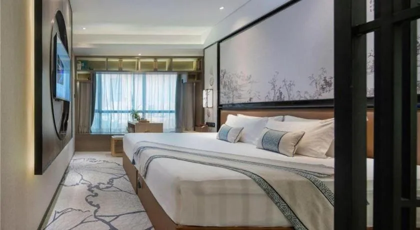 Bed in Yuan Culture Hotel Shenzhen World Shajing