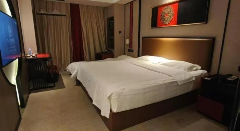 Bed in Yuan Culture Hotel Shenzhen World Shajing