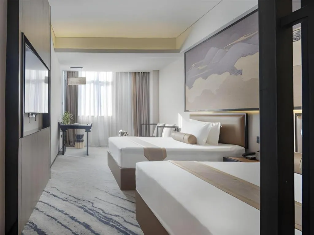 Bed in Yuan Culture Hotel Shenzhen World Shajing