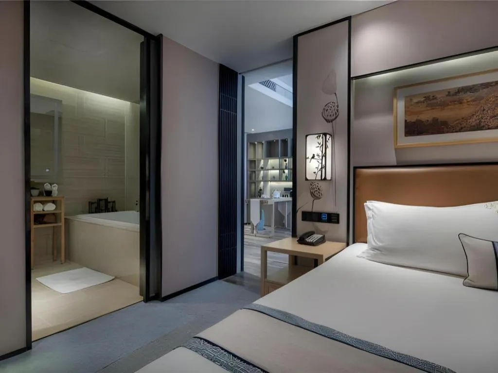 Bed in Yuan Culture Hotel Shenzhen World Shajing