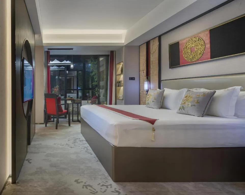 Bed in Yuan Culture Hotel Shenzhen World Shajing