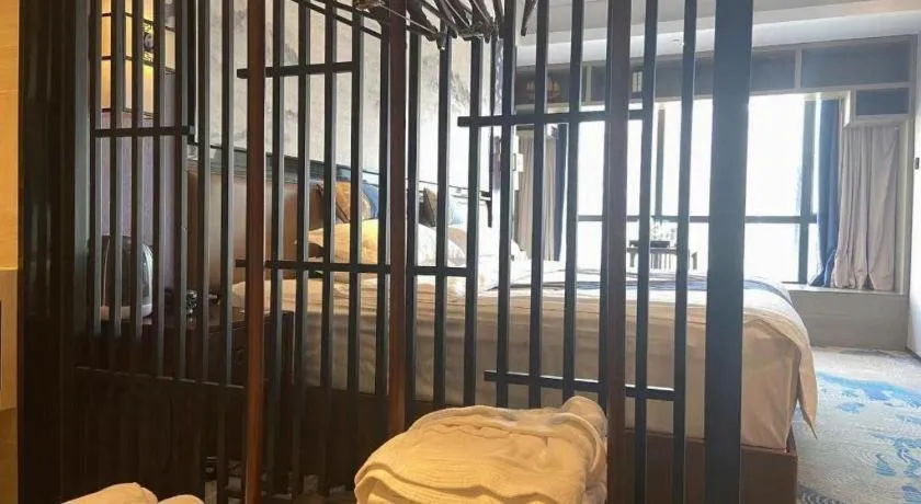 Bed in Yuan Culture Hotel Shenzhen World Shajing