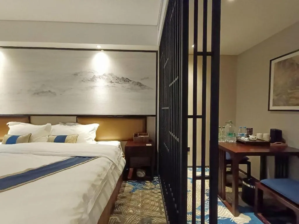 Bed in Yuan Culture Hotel Shenzhen World Shajing