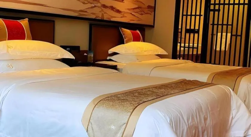Bed in Yuan Culture Hotel Shenzhen World Shajing