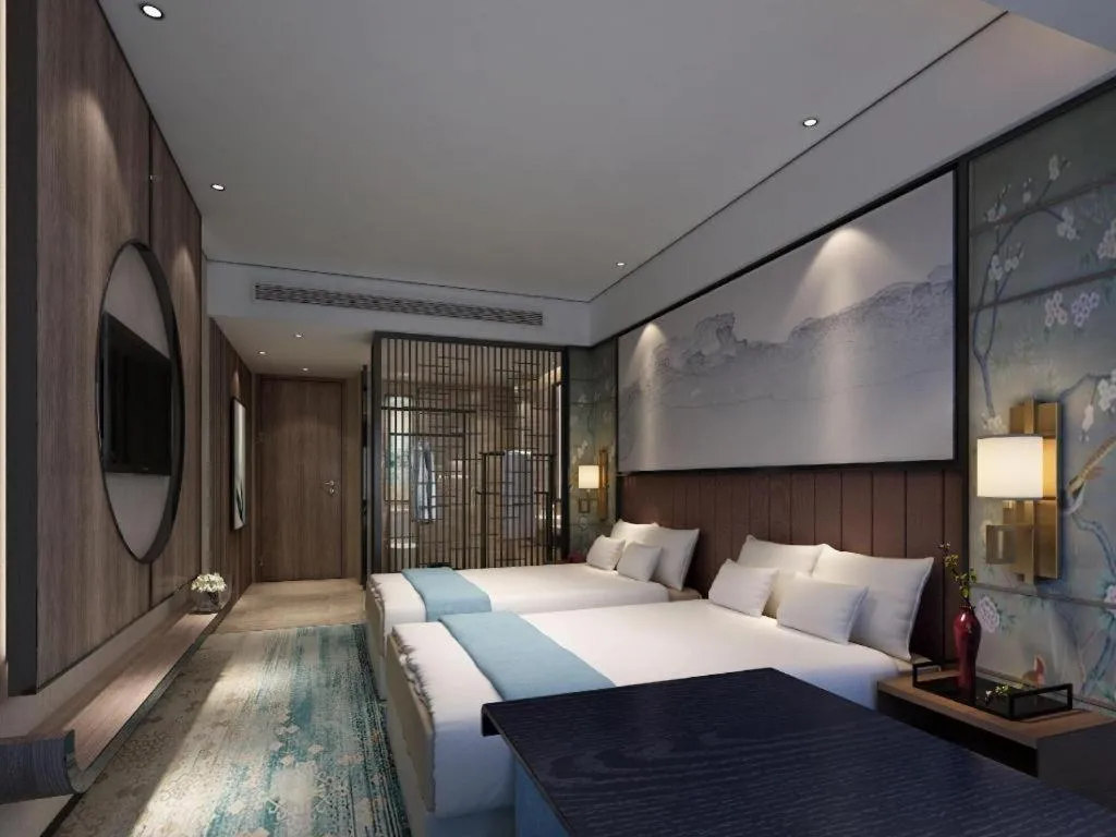 Bed in Yuan Culture Hotel Shenzhen World Shajing