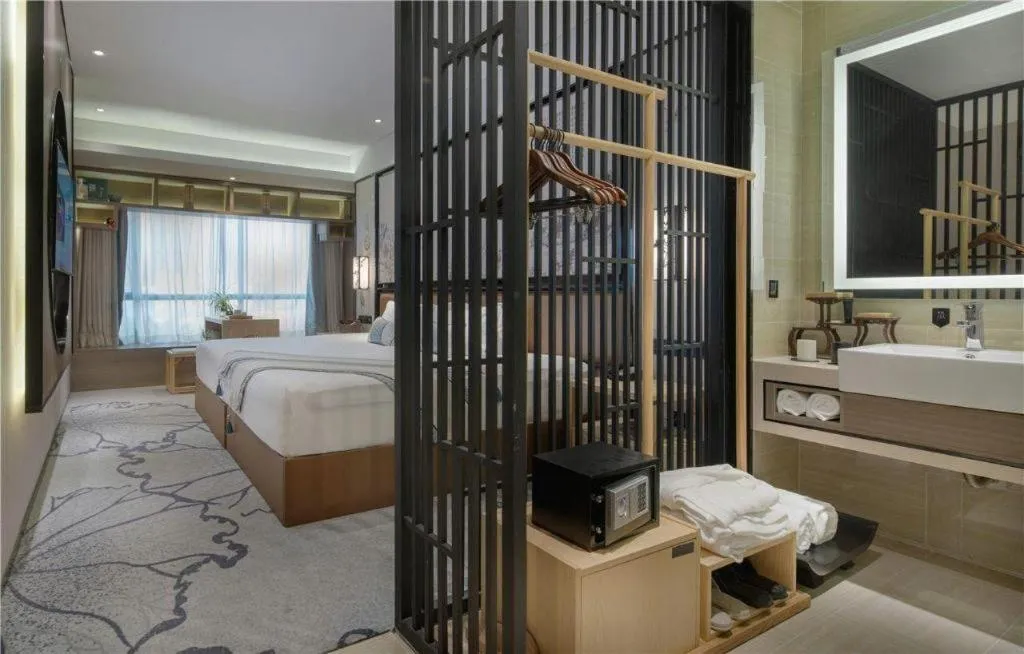 Bed in Yuan Culture Hotel Shenzhen World Shajing